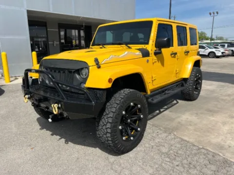 Yellow 2015 Jeep Wrangler Unlimited Wrangler X for sale in San Antonio, TX