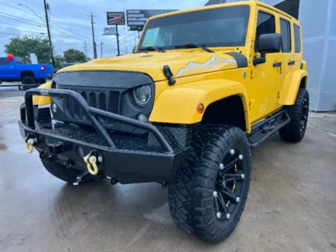 Yellow 2015 Jeep Wrangler Unlimited Wrangler X for sale in San Antonio, TX