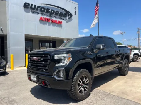 Photos of 2021 GMC Sierra 1500 4WD Crew Cab Short Box AT4 for sale in San Antonio, TX at Eurospeed International Corp