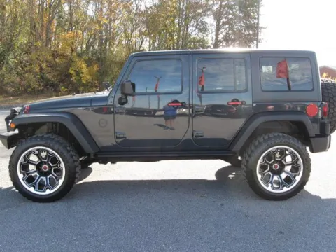Photos of 2016 Jeep Wrangler Unlimited Sport for sale in Pelham, AL at Susan Schein Automotive - Pelham