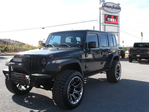 Gray 2016 Jeep Wrangler Unlimited Sport for sale in Pelham, AL
