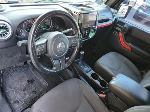 Photos of 2016 Jeep Wrangler Unlimited Sport for sale in Pelham, AL at Susan Schein Automotive - Pelham