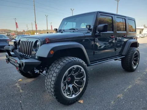 Gray 2016 Jeep Wrangler Unlimited Sport for sale in Pelham, AL