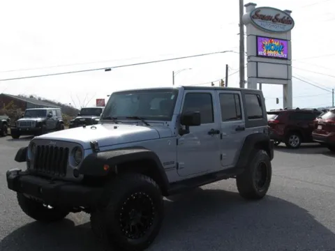 Gray 2015 Jeep Wrangler Unlimited Sport for sale in Pelham, AL