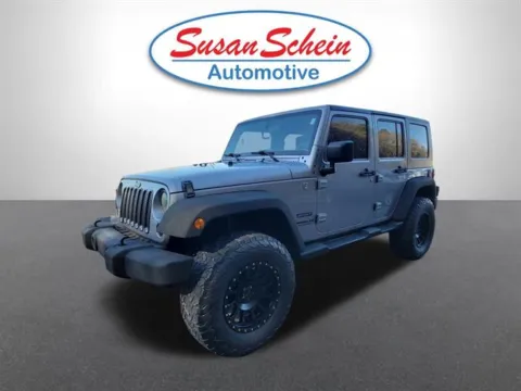 Gray 2015 Jeep Wrangler Unlimited Sport for sale in Pelham, AL