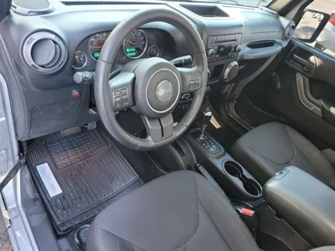 Photos of 2015 Jeep Wrangler Unlimited Sport for sale in Pelham, AL at Susan Schein Automotive - Pelham