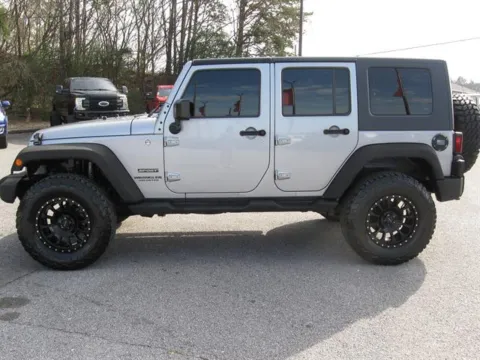 Photos of 2015 Jeep Wrangler Unlimited Sport for sale in Pelham, AL at Susan Schein Automotive - Pelham