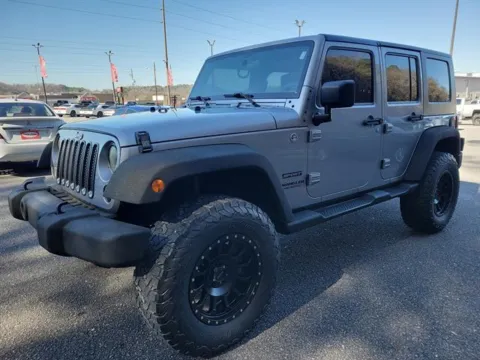 Gray 2015 Jeep Wrangler Unlimited Sport for sale in Pelham, AL