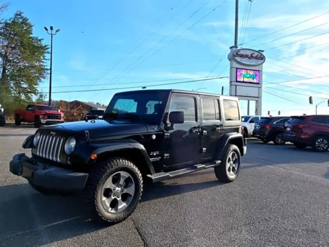 Black 2017 Jeep Wrangler Unlimited Sahara for sale in Pelham, AL
