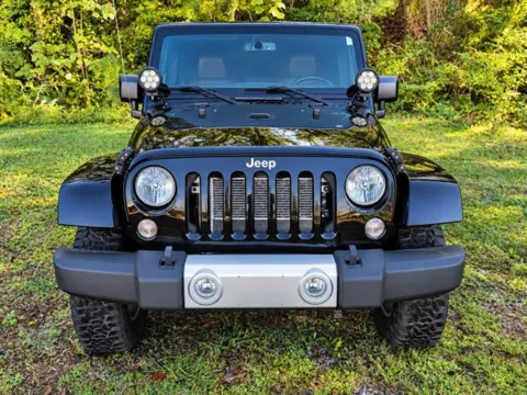 Photos of 2015 Jeep Wrangler Unlimited Sahara for sale in Pelham, AL at Susan Schein Automotive - Pelham