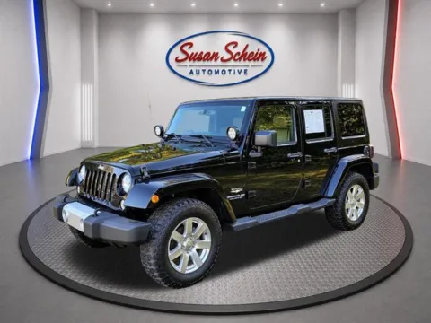 Black 2015 Jeep Wrangler Unlimited Sahara for sale in Pelham, AL