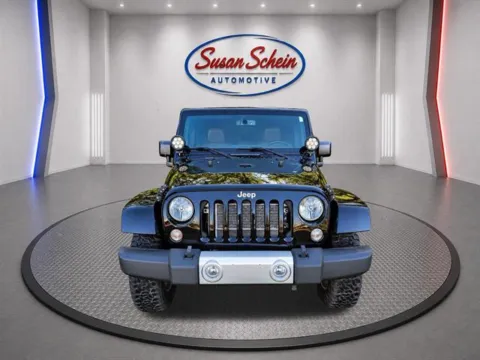 Photos of 2015 Jeep Wrangler Unlimited Sahara for sale in Pelham, AL at Susan Schein Automotive - Pelham