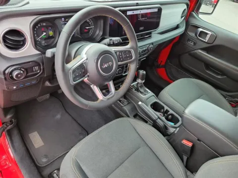 Photos of 2024 Jeep Wrangler 4xe Sahara 4xe for sale in Pelham, AL at Susan Schein Automotive - Pelham