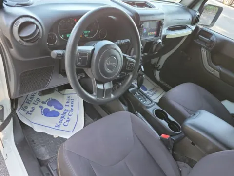 Photos of 2015 Jeep Wrangler for sale in Pelham, AL at Susan Schein Automotive - Pelham