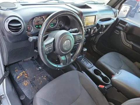 Photos of 2016 Jeep Wrangler Unlimited Sport for sale in Pelham, AL at Susan Schein Automotive - Pelham