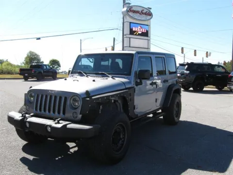 Silver 2016 Jeep Wrangler Unlimited Sport for sale in Pelham, AL