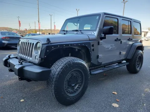 Silver 2016 Jeep Wrangler Unlimited Sport for sale in Pelham, AL
