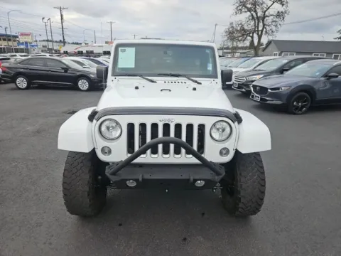 Photos of 2017 Jeep Wrangler Unlimited Sahara Sport Utility 4D for sale in Tacoma, WA at All American Motors