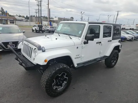 Another view of 2017 Jeep Wrangler Unlimited Sahara Sport Utility 4D for sale in Tacoma, WA at All American Motors