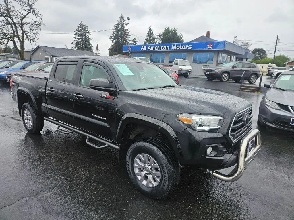 Red 2018 Toyota Tacoma Double Cab SR5 Pickup 4D 6 ft for sale in Tacoma, WA