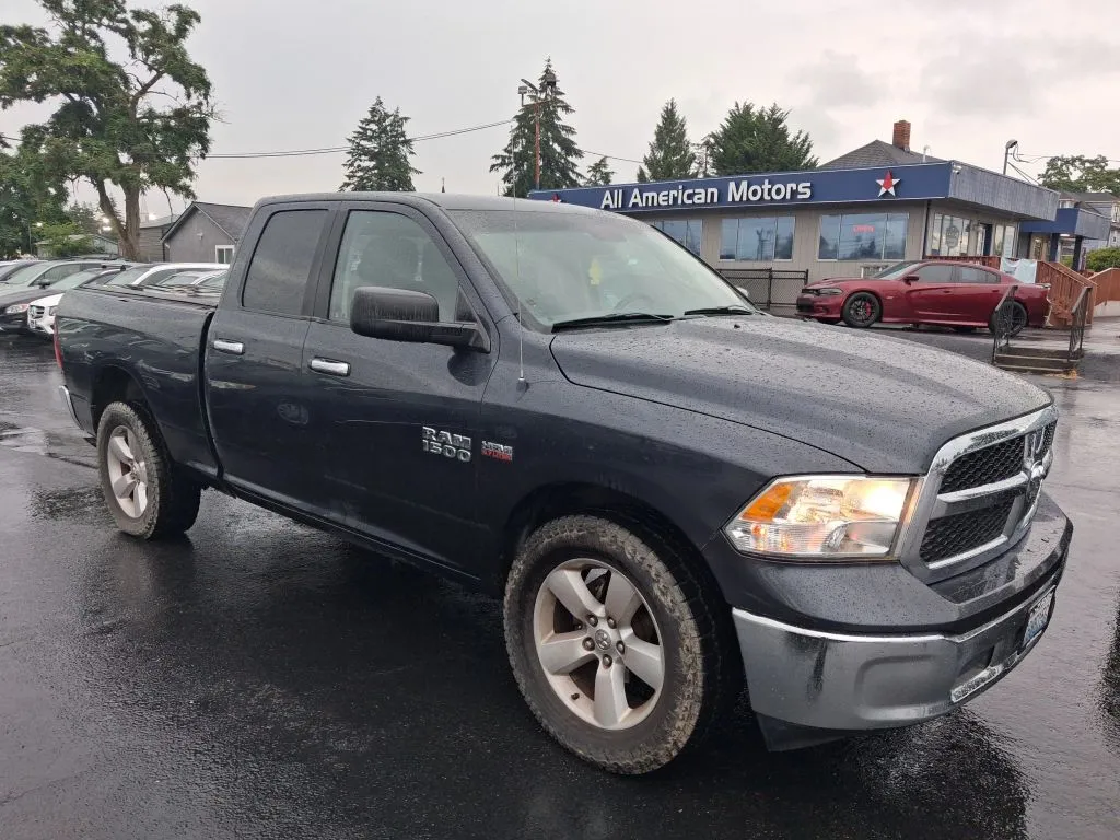 2013 Ram 1500 Quad Cab SLT Pickup 4D 6 1/3 ft for sale in Tacoma, WA