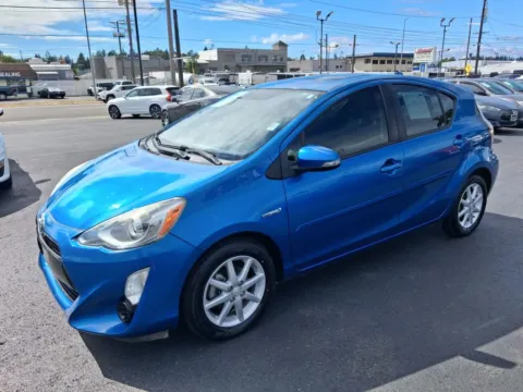 Another view of 2015 Toyota Prius c Three Hatchback 4D for sale in Tacoma, WA at All American Motors