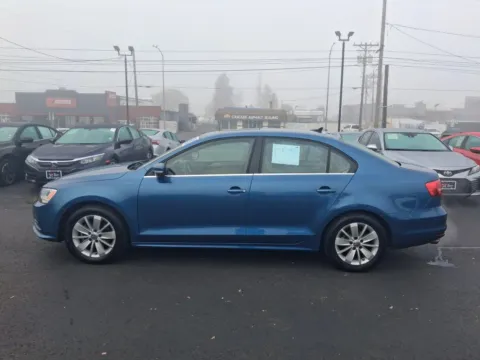 More photos of 2015 Volkswagen Jetta 1.8T SE Sedan 4D at All American Motors, WA