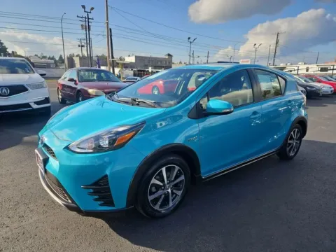 Another view of 2018 Toyota Prius c Three Hatchback 4D for sale in Tacoma, WA at All American Motors