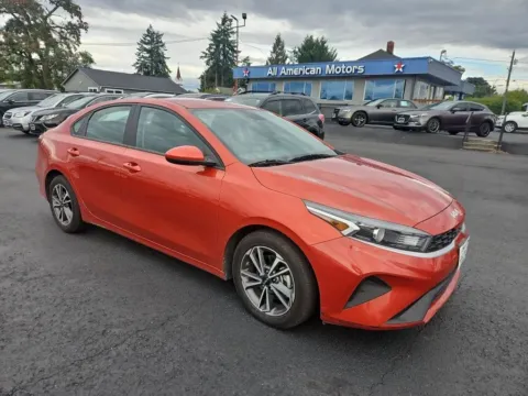 Orange 2023 Kia Forte LXS Sedan 4D for sale in Tacoma, WA