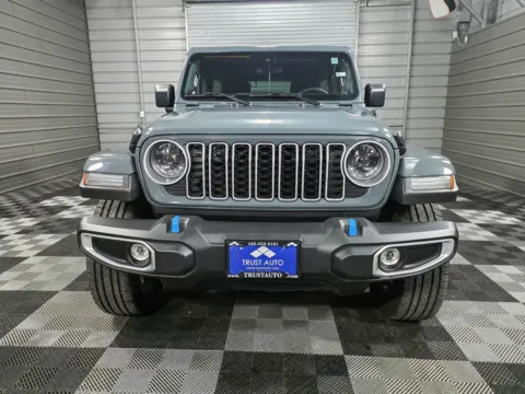 Another view of 2024 Jeep Wrangler 4xe Sahara 4WD Hard-Top Plug-in Hybrid SUV for sale in Sykesville, MD at Trust Auto