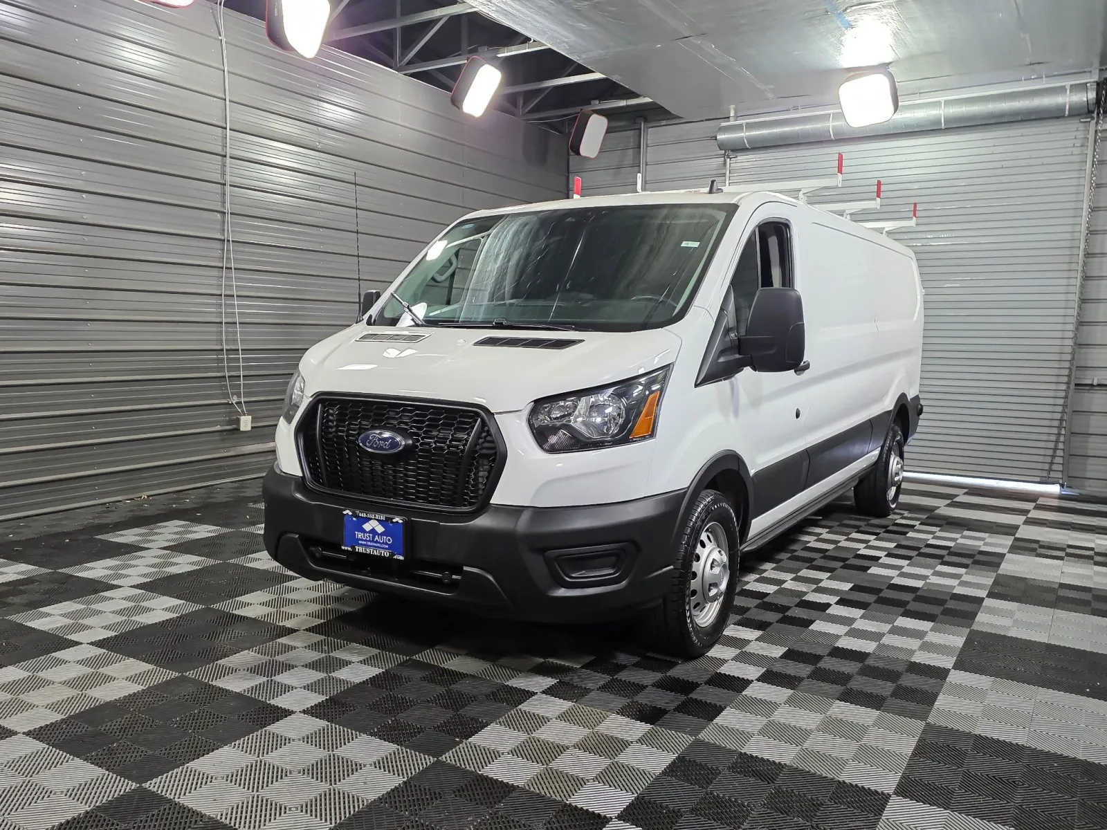 White 2024 Ford Transit T-150 Cargo 148''WB Low Roof AWD Minivan/Van w/Roof Racks for sale in Sykesville, MD