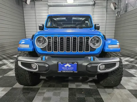 Photos of 2024 Jeep Wrangler 4xe Sahara for sale in Sykesville, MD at Trust Auto