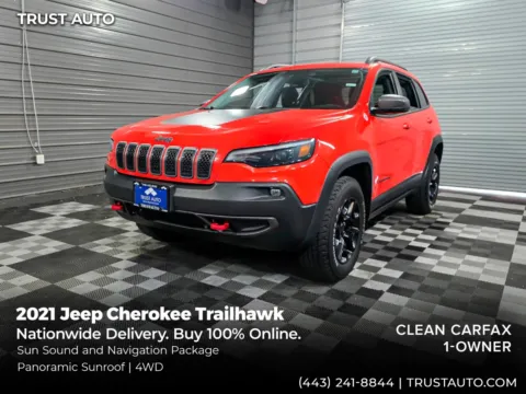 Orange 2021 Jeep Cherokee Trailhawk 4WD SUV for sale in Sykesville, MD