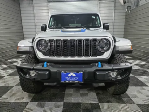 Another view of 2024 Jeep Wrangler 4xe Rubicon X 4WD Hard-Top Hybrid SUV for sale in Sykesville, MD at Trust Auto