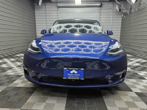 Photos of 2025 Tesla Model Y Long Range Dual Motor AWD Electic Sedan w/Full Self-Driving Computer for sale in Sykesville, MD at Trust Auto