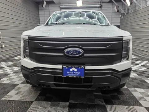 Photos of 2023 Ford F-150 Lightning Pro for sale in Sykesville, MD at Trust Auto