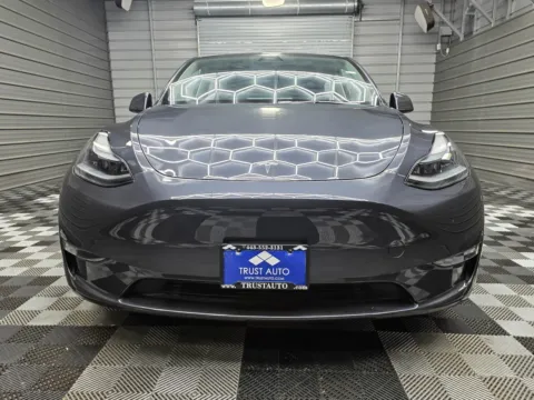 Another view of 2025 Tesla Model Y Long Range AWD Electric SUV for sale in Sykesville, MD at Trust Auto