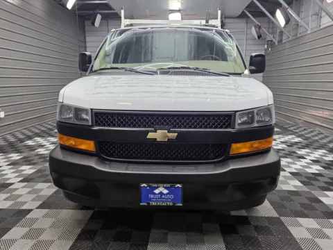 Another view of 2020 Chevrolet Express 2500 Cargo 135''WB Low Roof Minivan/Van w/Roof Racks/Shelving Storage System for sale in Sykesville, MD at Trust Auto