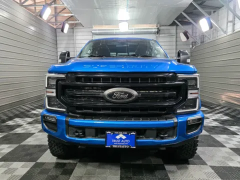 Another view of 2021 Ford Super Duty F-250 LARIAT 4WD Crew Cab Power Stroke Diesel Pickup Truck w/Black Appearance/Tremor Pkg for sale in Sykesville, MD at Trust Auto
