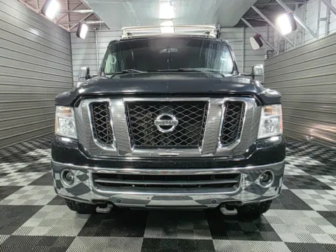 Another view of 2017 Nissan NV3500 12-Passenger SL 5.6L V8 Minivan/Van w/Roof Rack for sale in Sykesville, MD at Trust Auto