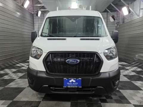 Another view of 2021 Ford Transit T-250 Cargo 148''WB Medium Roof 10FT Bed Minivan/Van w/Roof Racks for sale in Sykesville, MD at Trust Auto