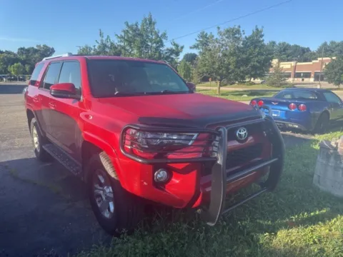 Orange 2015 Toyota 4Runner SR5 Premium for sale in Brighton, MI