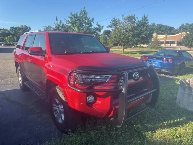 Orange 2015 Toyota 4Runner SR5 Premium for sale in Brighton, MI