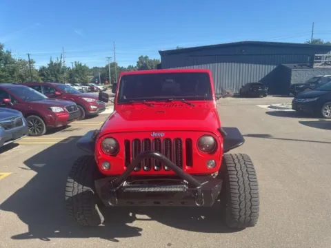 Photos of 2014 Jeep Wrangler Unlimited Sport for sale in Brighton, MI at Brighton Motors