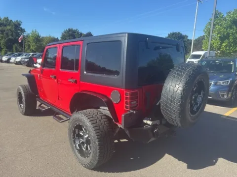 Another view of 2014 Jeep Wrangler Unlimited Sport for sale in Brighton, MI at Brighton Motors
