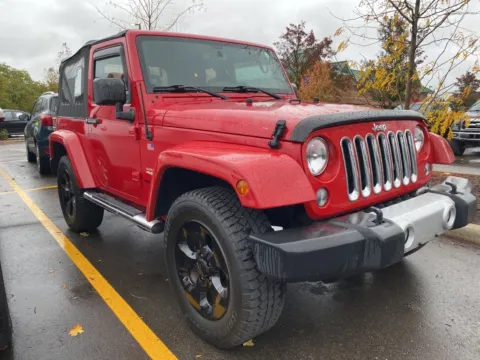 Photos of 2014 Jeep Wrangler Sahara for sale in Wixom, MI at Wixom Motors