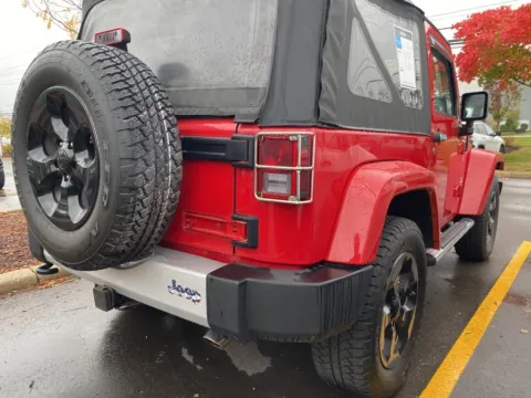Another view of 2014 Jeep Wrangler Sahara for sale in Wixom, MI at Wixom Motors