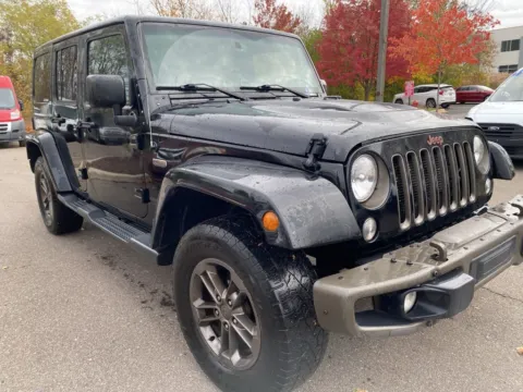 Photos of 2016 Jeep Wrangler Unlimited Sahara for sale in Wixom, MI at Wixom Motors