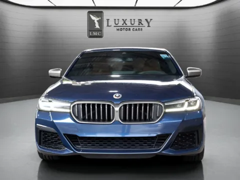 Another view of 2023 BMW 5 Series M550i xDrive for sale in Hillside, NJ at Luxury Motor Cars