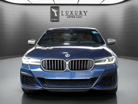 Another view of 2023 BMW 5 Series M550i xDrive for sale in Hillside, NJ at Luxury Motor Cars